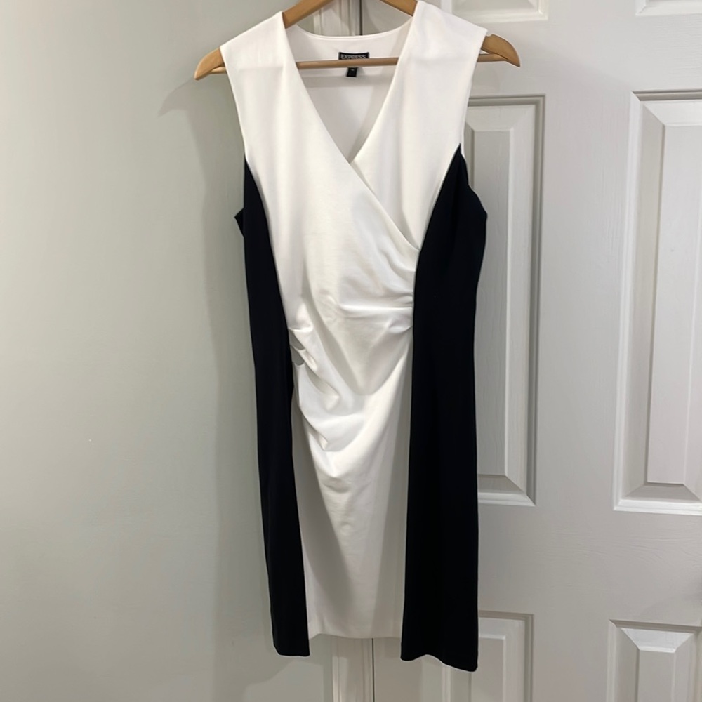 Express Dress Size 10. Black/white color blocking, and flattering ruching.